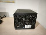 a black box with two fans on top of it