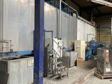 an image of a factory with a lot of machinery