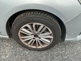 a close up of a car ' s tire on the road