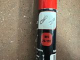 a close up of a red pipe with a wren on it