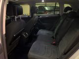 the back seats of a car are empty and the passenger seat is empty