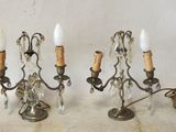 two candles that are sitting on a table