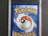 a close up of a pokemon card in a plastic case