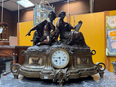 a clock that is sitting on a table in a room