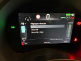 the dashboard of a car with a digital display on it ' s dashboard