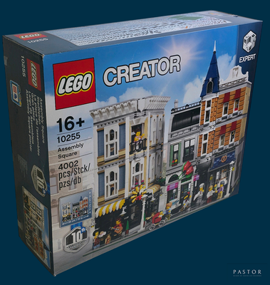 une boîte contenant un kit Lego Creator, sur fond bleu