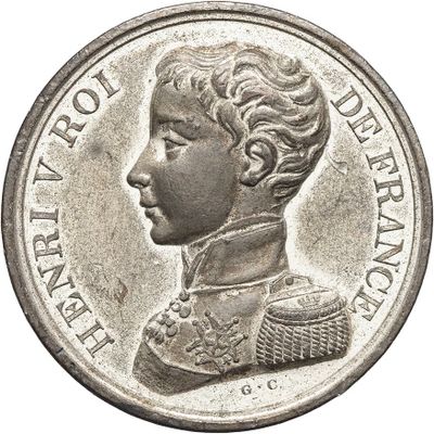 a close up of a coin with a portrait of a man on it