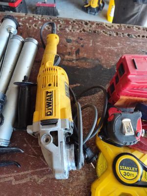 many tools that are sitting on a brick floor