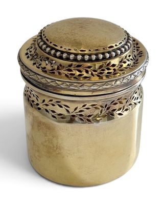 an image of a gold box with a lid on a white background