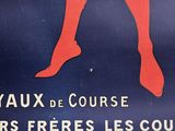 a poster of a woman ' s legs in red stockings