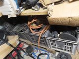 a pile of assorted electrical equipment in a room
