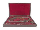 a case with a gun and a knife inside of it