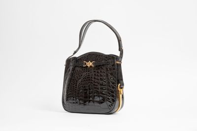 BERMA Sac à main en crocodile noir. Doublure en cuir noir. B…