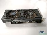 a close up of a video card with two fans on top of it