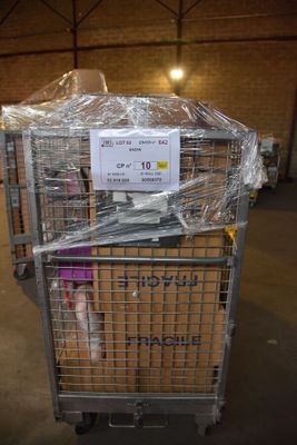 a metal cart with a sign on top of it in a warehouse