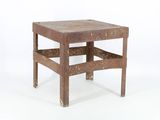 a small wooden table with a shelf on top of it