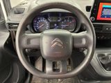the interior of a car with a steering wheel, dashboard, and dash board