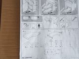 une boîte sur laquelle figurent des instructions, posée par terre