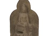 l'image d'une statue de femme assise sur une chaise