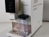 a coffee machine that is sitting on a table