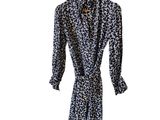 a black and white dress with a floral pattern on it