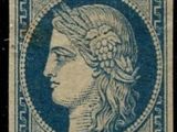 a close up of a stamp with a woman ' s face on it