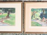 two paintings on the wall of a room with blue and green wallpaper