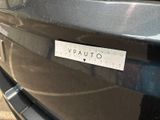a sticker on the back of a car that says vattio