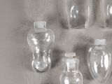 a lot of glass bottles that are on a table