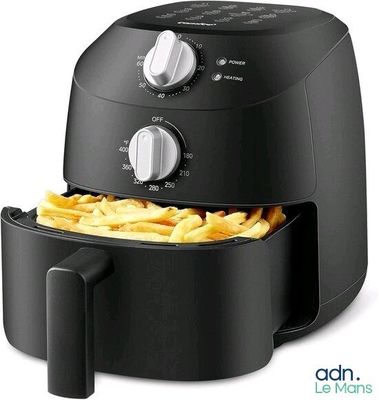 an image of a black air fryer with french fries in it