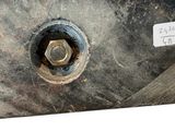 an image of a metal object with a screw on it
