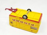 a yellow toy train car with a red handle on it