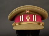 a hat that has a red ribbon on it