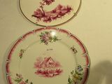 two plates that are sitting on a table
