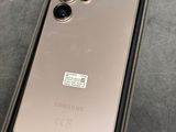 a close up of a samsung phone in a box with a price tag on it