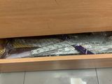 a drawer full of chocolates and candy wrappers