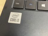 a close up view of a laptop keyboard on a table