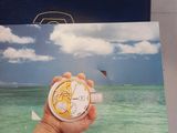 a picture of a person holding a clock in their hand