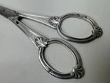 a pair of scissors that are sitting on a table