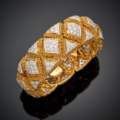 Bracelet en or jaune et gris 750 millièmes, la monture granulée présen - Photo 1