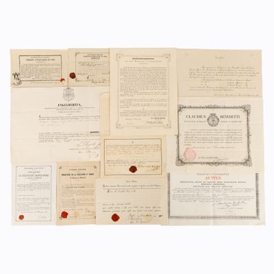 an old document with a lot of papers and stamps on it
