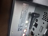 an image of a close up of a phone with a cord plugged into it