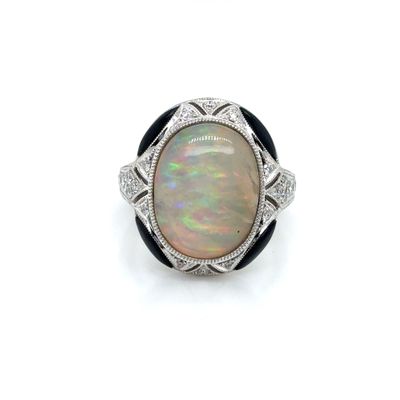 an oplite and diamond ring, by van cleef