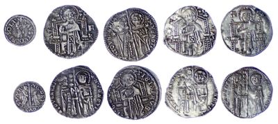 an image of a group of silver coins on a white surface