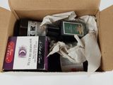 a box with a bottle of wine and a bottle of wine in it