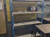 two tables and a shelf in a room