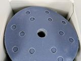 a box with a blue disc inside of it