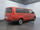 an image of a red van parked in a garage