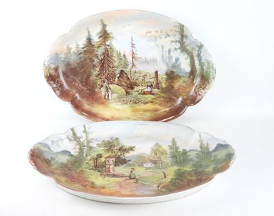 deux assiettes ornées d'une peinture représentant une scène de forêt