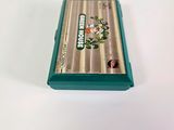 an image of a nintendo game console sitting on top of a white table